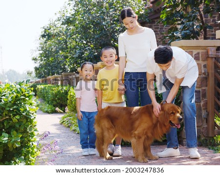 Happy family of four and pet dog in outdoor photo high quality photo
