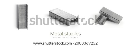 Metal staples isolated on a white background. High quality photo Royalty-Free Stock Photo #2003369252