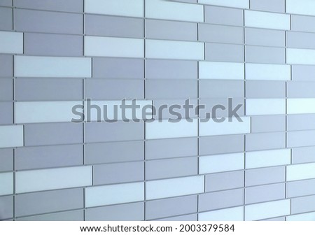 geometric pale blue metallic cladding modern architectural facade in perspective view