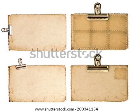 blank aged paper sheets with clip isolated on white background