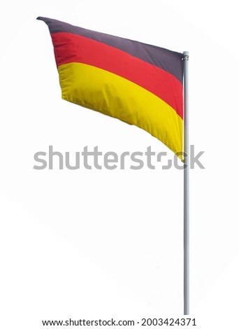 The German flag flies in a gentle breeze on a sunny day. The German Flag is a tricolor consisting of three equal horizontal bands displaying the national colors of Germany: black, red, and gold