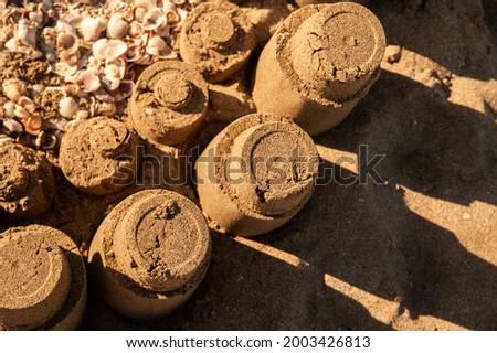 Sand cakes on the seashore