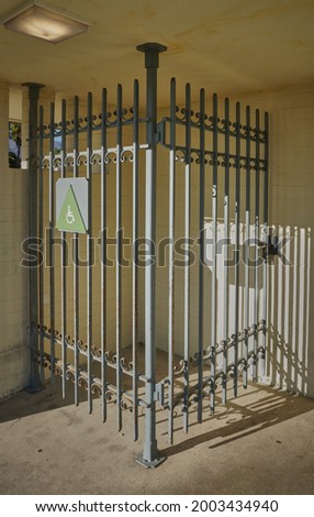       Cage with Handicapped Sign Attached                         