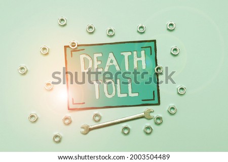 Conceptual caption Death Toll. Business overview the number of deaths resulting from a particular incident Maintenance Tools And Equipments Mechanic And Engineer Repairs Royalty-Free Stock Photo #2003504489