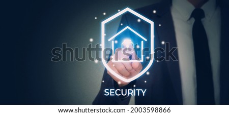 Hand of businessman pushing sign virtual lock while security system and safety with home for protection and privacy of family, secure and access digital for residential, business futuristic concept.