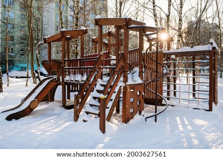 Playground on a frosty morning after a snowfall