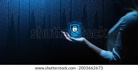 Business woman holding  padlock in hand on binary background. Global networking connection background. Network security and data protection.