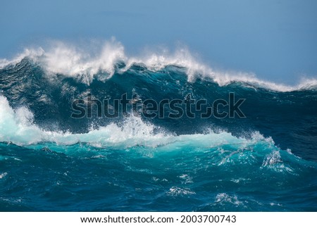 Big wave breaking on the sea Royalty-Free Stock Photo #2003700743