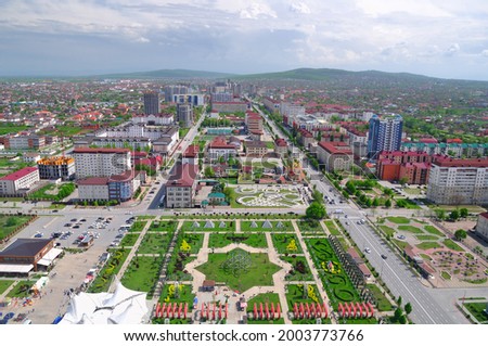 Flower Park with symbol of six-pointed star of David and views of the city of Grozny, Chechnya, Russia. Aerial view from the observation deck of the complex Grozny City