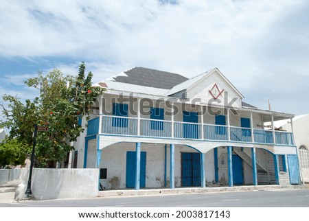 The abandoned 19th century warehouse on Front Street, the main street in Cockburn Town on Grand Turk island (Turks and Caicos Islands).