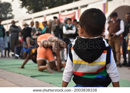 Small kid learning wrestling. Kurukshetra, India