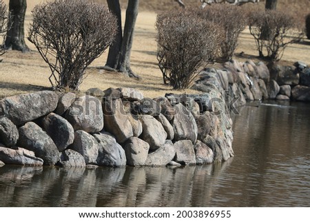 pond with beautiful rock cliffs
