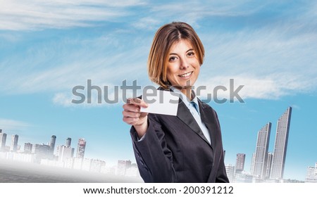 portrait of a business young woman showing her visit card