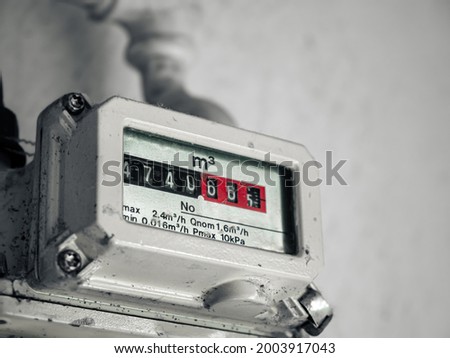 Analog screen of household natural gas meter.  Royalty-Free Stock Photo #2003917043
