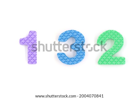 number 132 isolated on white background. Colorful letters on background close up. Alphabet toy. Number one hundred thirty two.