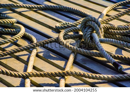 Ship rope knot in water.