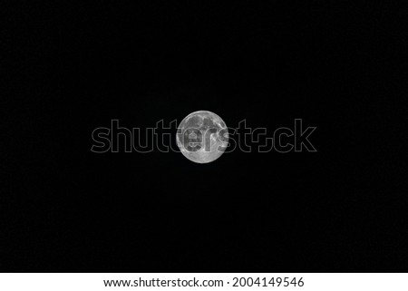 Full moon in the clear night sky
