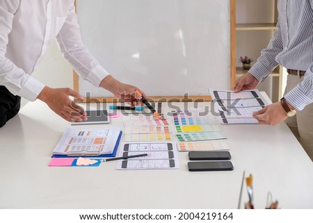 Close-up of a group of business people designing create and develop UX UI Office