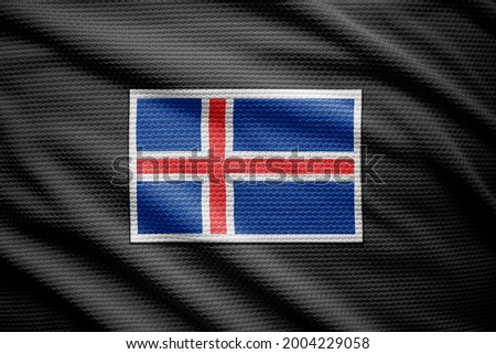 Iceland flag isolated on black jersey. National symbols of Iceland.