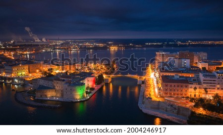 Aerial view of Taranto city at night, Puglia. Italy
