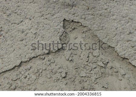 natural texture of gray white sand in a heap