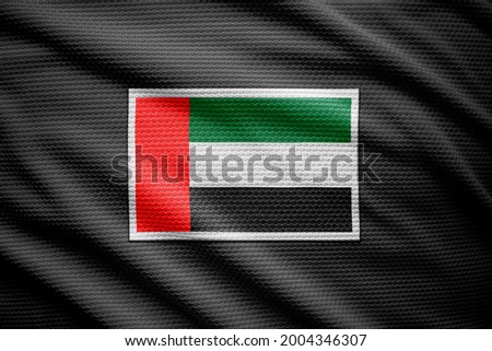 United Arab Emirates flag isolated on black jersey. National symbols of United Arab Emirates.