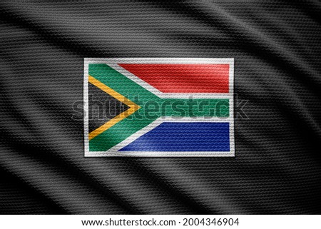 South Africa flag isolated on black jersey. National symbols of South Africa.