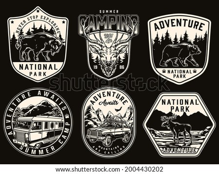 Camping and national park vintage prints with walking bear bison moose deer head motorhome and travel car with tourist equipment isolated vector illustration Royalty-Free Stock Photo #2004430202