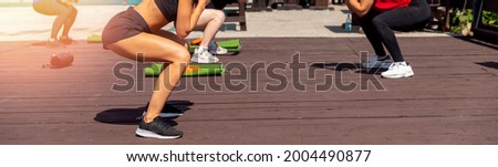Banner fitness sport, group of women training outdoors.