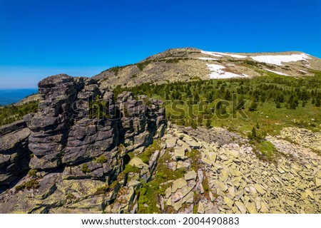 Sheregesh ski resort in summer, landscape on mountain Mustag, aerial top view Kemerovo region Russia.