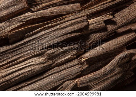 Agarwood Chips, Oud incense sticks Royalty-Free Stock Photo #2004599981