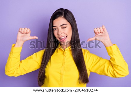 Photo of pretty nice charming young woman win eye proud point fingers myself isolated on purple color background