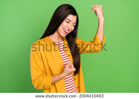 Profile photo of hooray brown hairdo millennial lady yell hands fists wear yellow shirt isolated on green color background