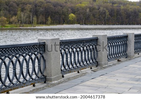 Cast-iron fence of the embankment of the Moskva River. Perspective view