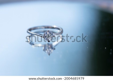 Close up of elegant diamond ring. Love concept. Love photo. Ring. Photo. Background. Gift. 