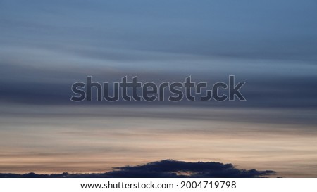 blurred evening sky Beautiful sunset with faded red sky pictures for art background.