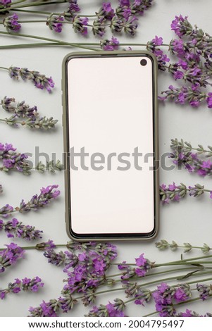 phone mockup with lavender flowers with copy space