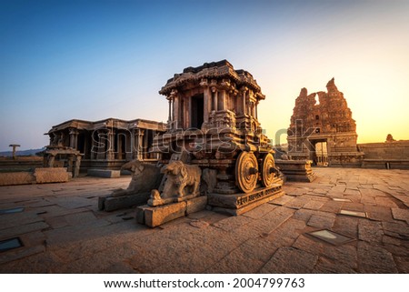 Hampi, Karnataka, India - January 10, 2020: Vijaya Vitthala Temple. Beautifully carved out of a monolith rock, a piece of intricate architectural marvel that the ancients built. Royalty-Free Stock Photo #2004799763