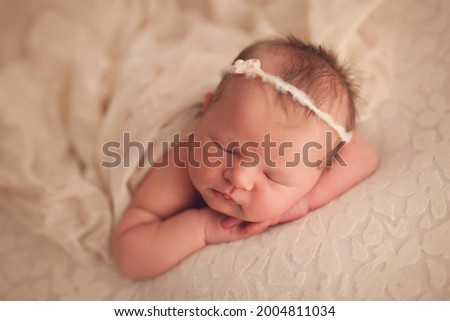 Newborn baby girl sleeping 10 day old