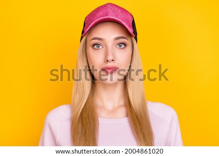 Photo of charming shiny young lady wear pink sweater headwear isolated yellow color background
