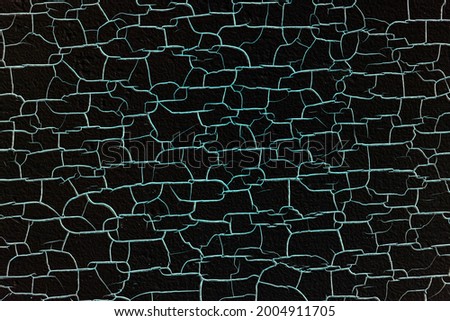 wood texture surface is blue glow color cracked and swelling, from the temperature of the heat from the sunlight that shines for a long time