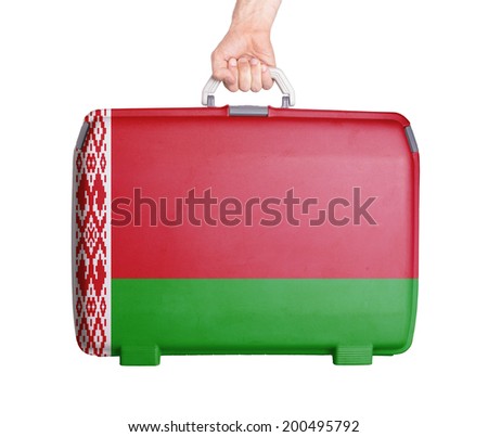 Used plastic suitcase with stains and scratches, printed with flag, Belarus