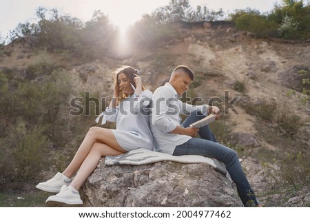 Young couple in love in stone career