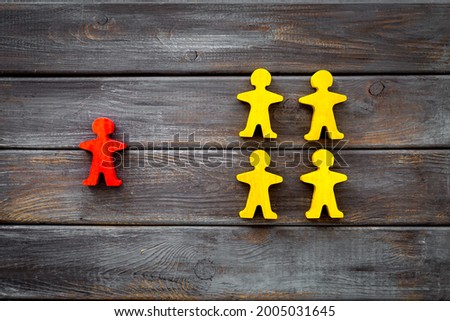 Social distance concept with wooden figures. Top view