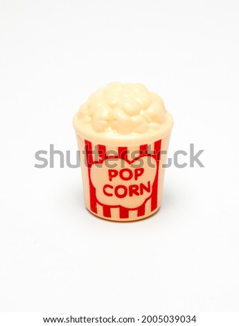 popcorn in a bucket toy on white background