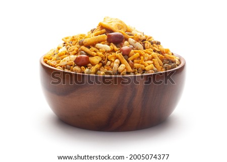 Close up of spicy Ratlami mixture Indian namkeen (snacks) In hand-made (handcrafted) wooden bowl. Royalty-Free Stock Photo #2005074377