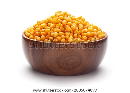 Close up of crunchy masala boondi Indian namkeen (snacks) In hand-made (handcrafted) wooden bowl Royalty-Free Stock Photo #2005074899