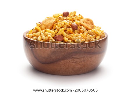 Close up of Bhel puri Indian namkeen (snacks) In hand-made (handcrafted) wooden bowl
