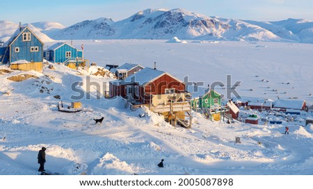 The traditional and remote Greenlandic Inuit village Kullorsuaq located at the Melville Bay, in the far north of West Greenland, Danish territory Royalty-Free Stock Photo #2005087898