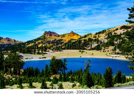 USA, California. Lassen Volcanic National Park, Lake Helen framed by Mounts Brokeoff and Diller and Pilot Pinnacle and Diamond Peak Royalty-Free Stock Photo #2005105256